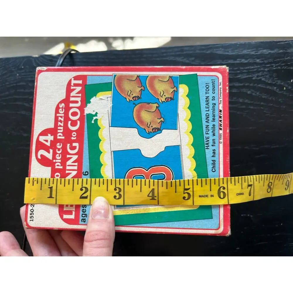 Vintage kids puzzle- made in USA- 1985- includes box- had signs of wear- numbers